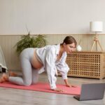 pregnant-woman-practicing-yoga-home_23-2149121122